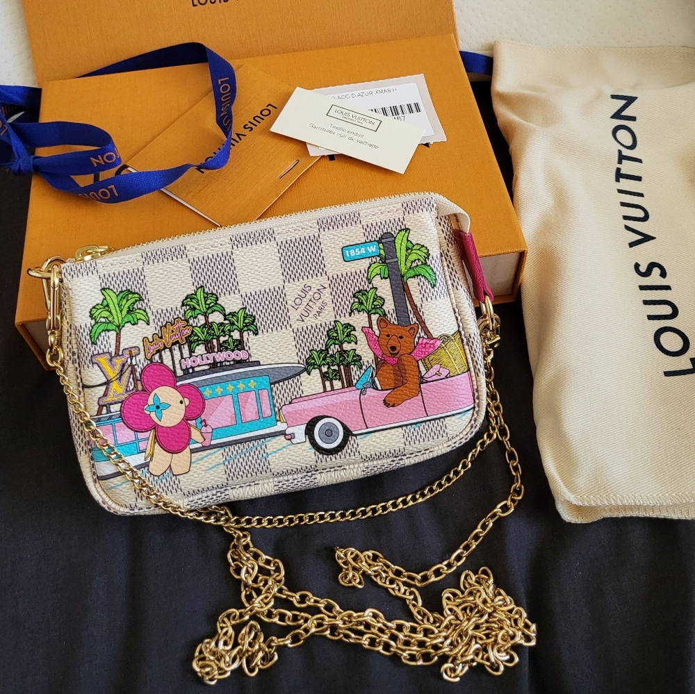 BRAND NEW authentic Louis Vuitton Xmas animation limited edition mini pochette